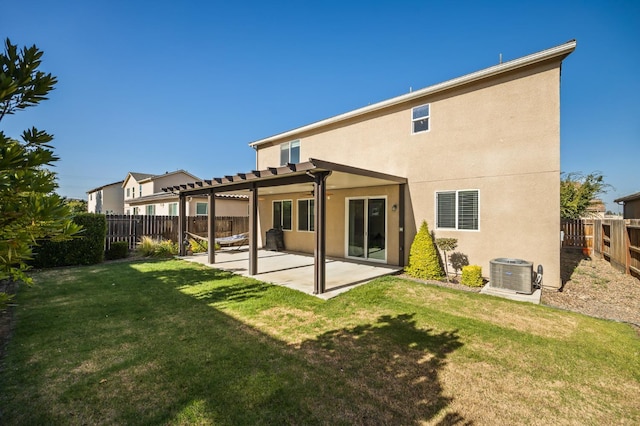 7141 N Shiraz Ave, Fresno, CA 93722 - back of property featuring stucco siding, a fenced backyard, a pergola, and a patio