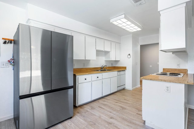 3318 Stanford Ave, Clovis, CA 93611 - kitchen featuring white appliances, white cabinetry, and light countertops