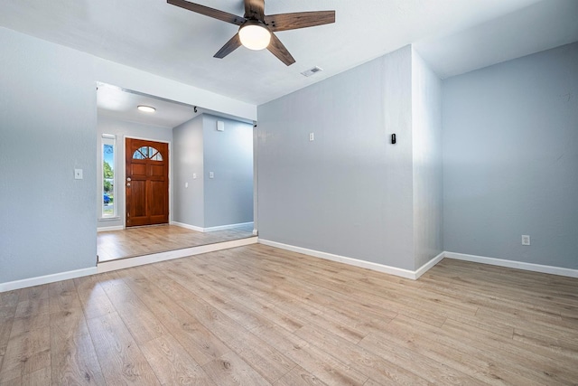 3318 Stanford Ave, Clovis, CA 93611 - foyer entrance with light wood-type flooring and a ceiling fan
