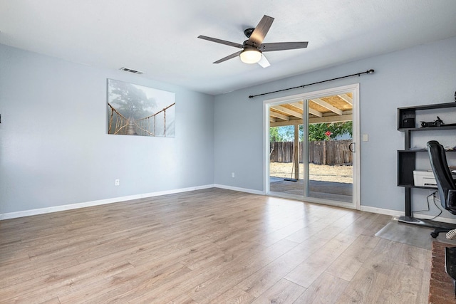 3318 Stanford Ave, Clovis, CA 93611 - unfurnished living room featuring wood finished floors and a ceiling fan
