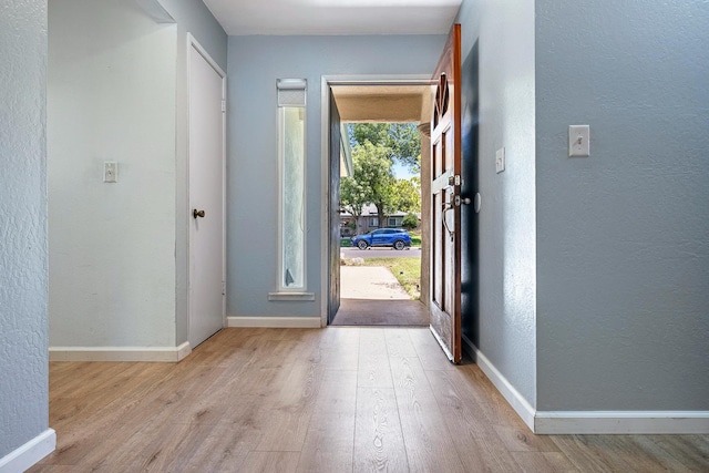 3318 Stanford Ave, Clovis, CA 93611 - foyer entrance with wood finished floors and a textured wall