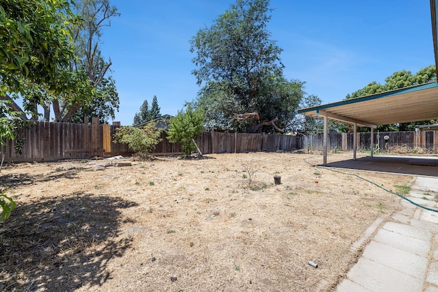 3318 Stanford Ave, Clovis, CA 93611 - fenced backyard featuring a patio area