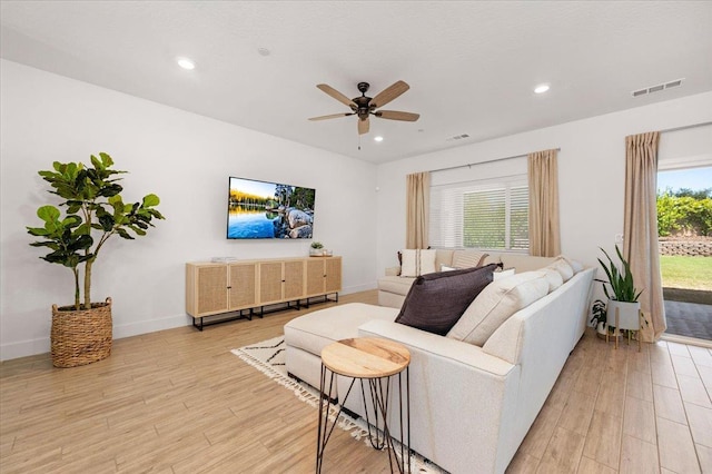 859 Windmill Ave, Clovis, CA 93619 - living area featuring light wood-style flooring, ceiling fan, and recessed lighting