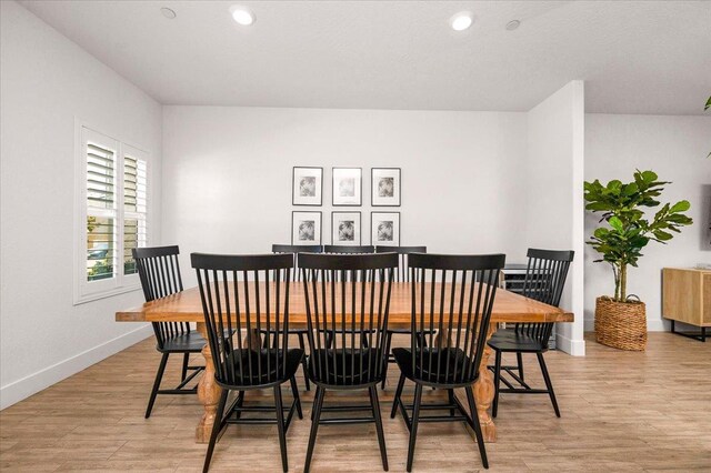 859 Windmill Ave, Clovis, CA 93619 - dining room with light wood-style flooring and recessed lighting