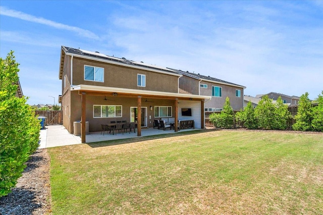 859 Windmill Ave, Clovis, CA 93619 - rear view of property featuring a fenced backyard, stucco siding, a patio, a ceiling fan, and outdoor lounge area