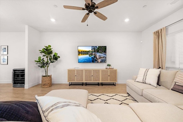 859 Windmill Ave, Clovis, CA 93619 - living room with wine cooler, wood finished floors, recessed lighting, and a ceiling fan