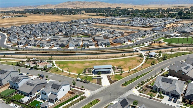 859 Windmill Ave, Clovis, CA 93619 - aerial view of property's location featuring nearby suburban area and a mountain backdrop