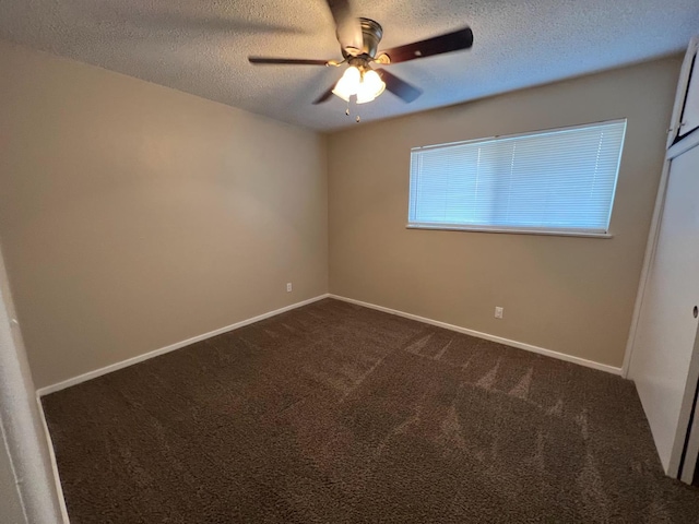1205 F St, Reedley, CA 93654 - spare room featuring a ceiling fan, a textured ceiling, and dark colored carpet