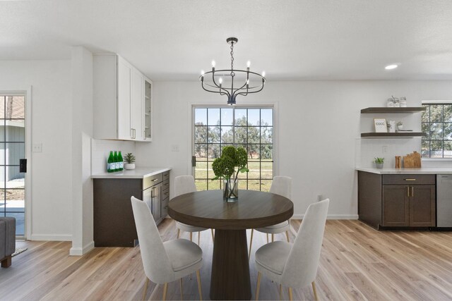 19730 Brightwood Rd, Madera, CA 93638 - dining room with a chandelier, light wood-type flooring, and recessed lighting