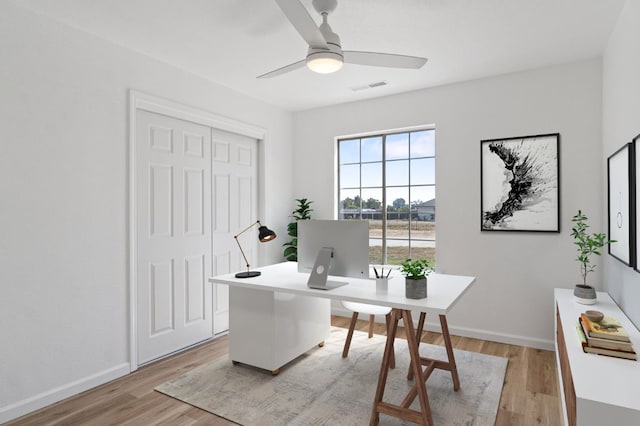 19730 Brightwood Rd, Madera, CA 93638 - office with light wood-style flooring and ceiling fan