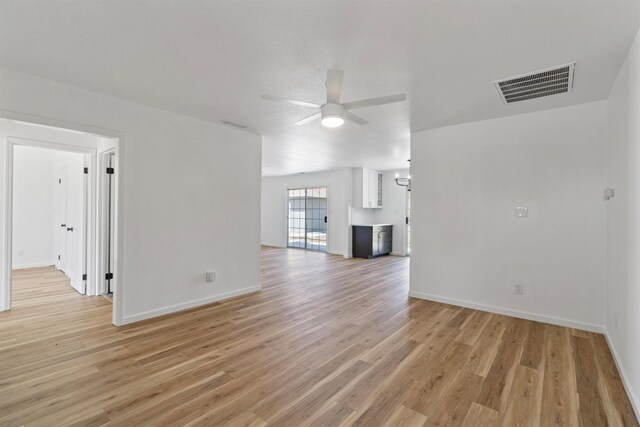 19730 Brightwood Rd, Madera, CA 93638 - unfurnished living room with ceiling fan and light wood-type flooring