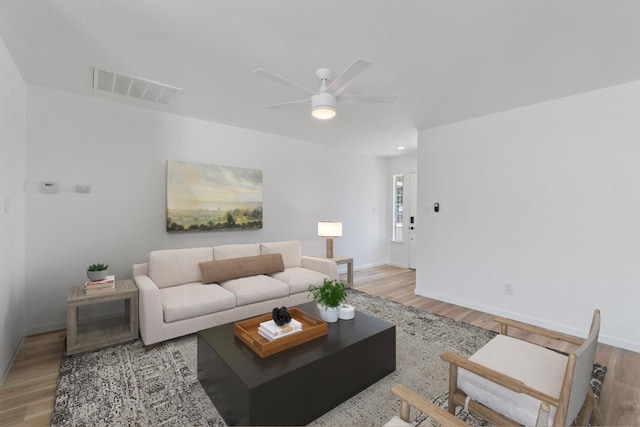 19730 Brightwood Rd, Madera, CA 93638 - living room with light wood-style floors and ceiling fan