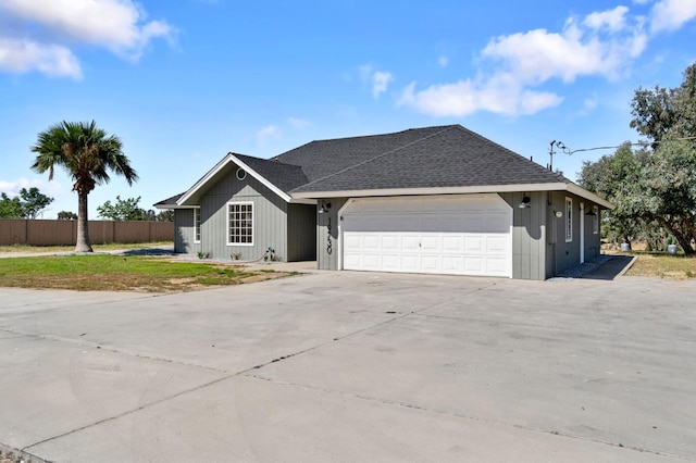 19730 Brightwood Rd, Madera, CA 93638 - view of front of house with roof with shingles, an attached garage, and concrete driveway