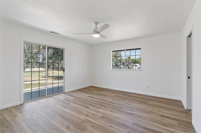 19730 Brightwood Rd, Madera, CA 93638 - empty room with a ceiling fan and wood finished floors