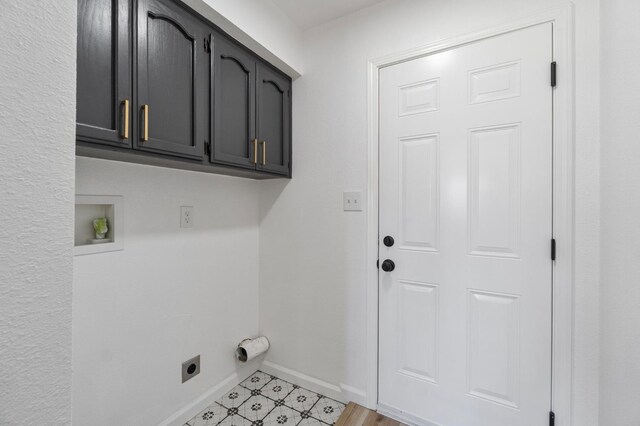 19730 Brightwood Rd, Madera, CA 93638 - laundry area featuring hookup for an electric dryer, cabinet space, and hookup for a washing machine