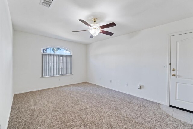 122 E Loop, Madera, CA 93637 - unfurnished room featuring ceiling fan and light carpet