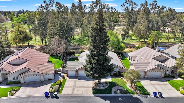 122 E Loop, Madera, CA 93637 - aerial view of property and surrounding area featuring a tree filled landscape