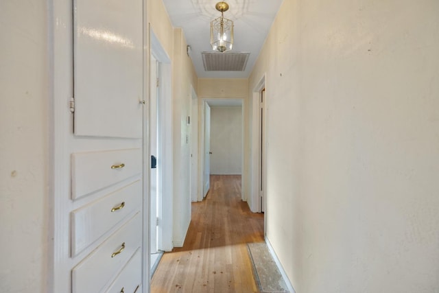 513 W Fountain Way, Fresno, CA 93705 - corridor featuring light wood-style flooring
