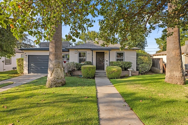 513 W Fountain Way, Fresno, CA 93705 - view of front of house featuring stucco siding, an attached garage, a front lawn, and driveway