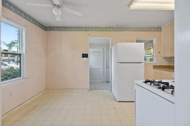 513 W Fountain Way, Fresno, CA 93705 - kitchen with white appliances, a ceiling fan, and light floors