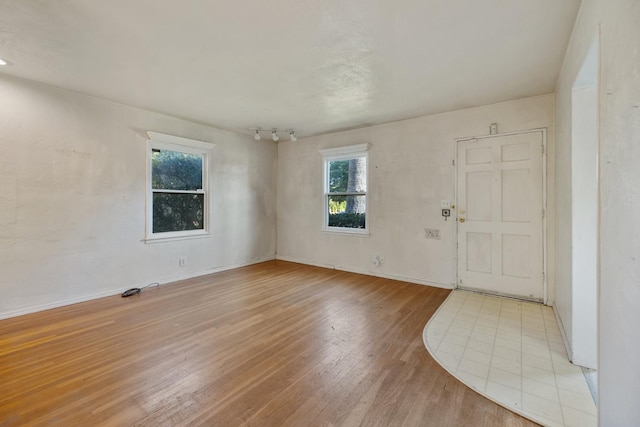 513 W Fountain Way, Fresno, CA 93705 - foyer with light wood-type flooring and baseboards