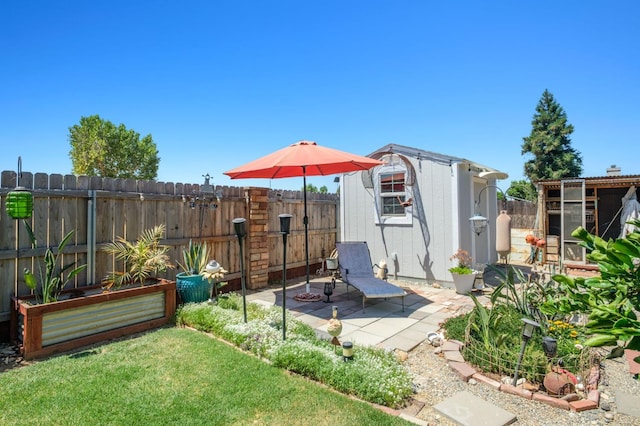 1620 Fir Ave, Clovis, CA 93611 - fenced backyard with a storage shed and a patio