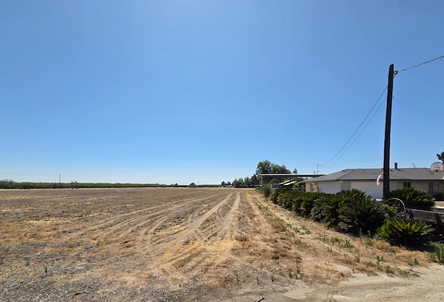5525 S Fig Ave, Fresno, CA 93706 - view of dirt / gravel road featuring a view of countryside