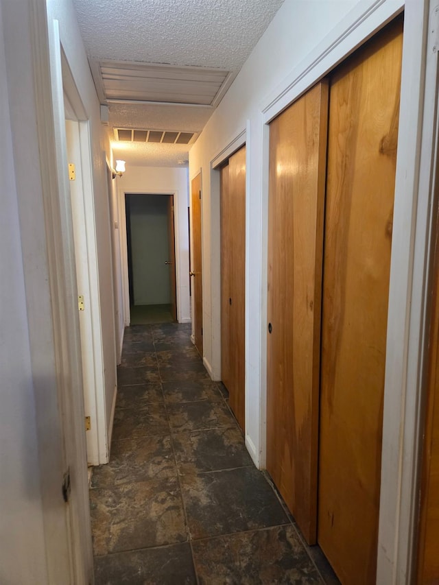 5525 S Fig Ave, Fresno, CA 93706 - hall with baseboards and a textured ceiling