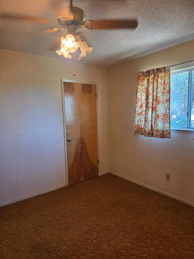 5525 S Fig Ave, Fresno, CA 93706 - unfurnished room featuring a ceiling fan, a textured ceiling, and carpet floors