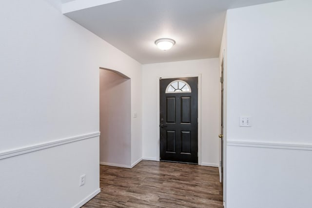 4665 W Yale Ave, Fresno, CA 93722 - entrance foyer featuring wood finished floors and arched walkways