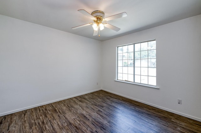 4665 W Yale Ave, Fresno, CA 93722 - unfurnished room with dark wood-style flooring and ceiling fan