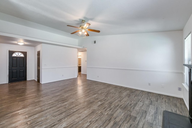 4665 W Yale Ave, Fresno, CA 93722 - unfurnished living room featuring ceiling fan and wood finished floors
