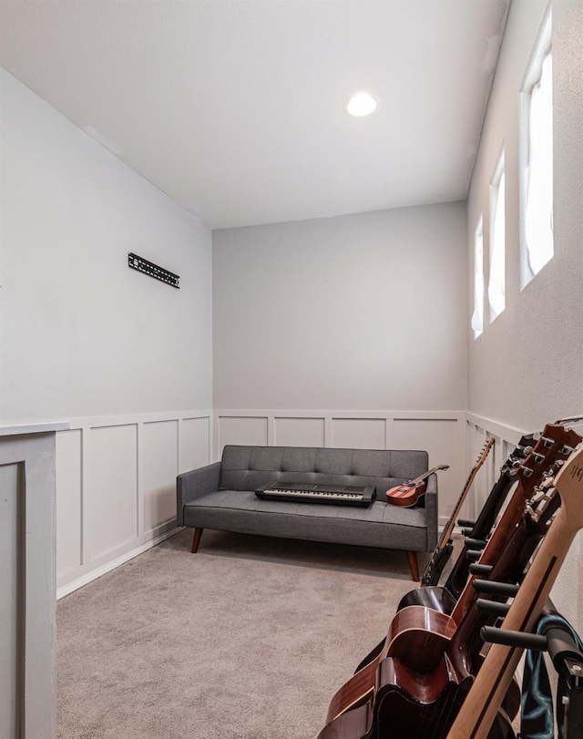 1734 Glen Oban Ln, Clovis, CA 93619 - carpeted living room with a decorative wall, a wainscoted wall, and recessed lighting