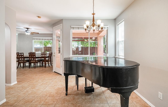 1734 Glen Oban Ln, Clovis, CA 93619 - living area with a chandelier, light tile patterned flooring, and ceiling fan