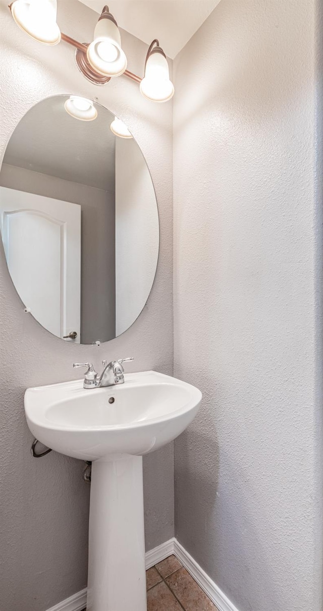 1734 Glen Oban Ln, Clovis, CA 93619 - bathroom with tile patterned floors and a sink