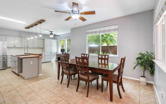 1734 Glen Oban Ln, Clovis, CA 93619 - dining area with a ceiling fan and light tile patterned floors