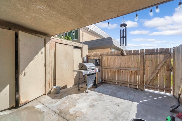 5098 E Ashlan Ave Unit 116, Fresno, CA 93727 - view of patio / terrace featuring grilling area