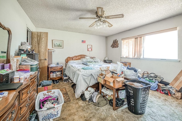 7815 N Sanders Ave, Clovis, CA 93619 - bedroom with a textured ceiling, carpet, and ceiling fan