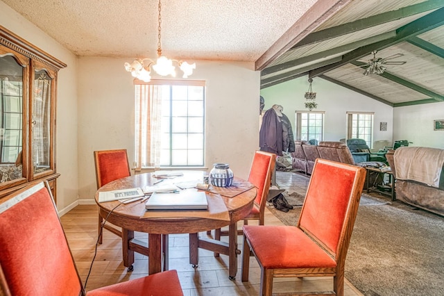 7815 N Sanders Ave, Clovis, CA 93619 - dining area featuring a chandelier, light wood-style flooring, and a textured ceiling