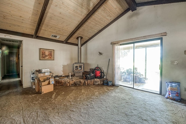 7815 N Sanders Ave, Clovis, CA 93619 - living room with a wood stove, carpet floors, high vaulted ceiling, and a wood ceiling with exposed beams