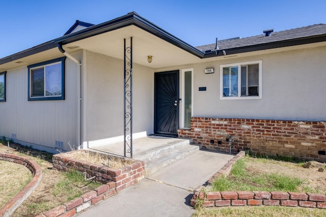 786 E Barstow Ave, Fresno, CA 93710 - doorway to property featuring crawl space and brick siding
