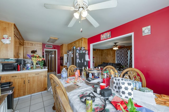786 E Barstow Ave, Fresno, CA 93710 - dining room with a ceiling fan and light tile patterned floors