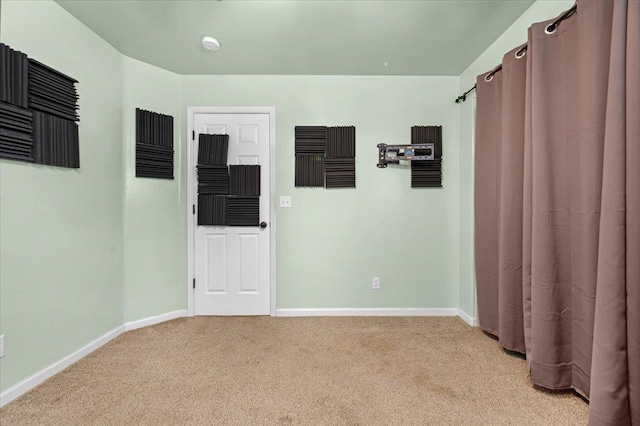 3673 N Denali Ave, Fresno, CA 93727 - empty room featuring light carpet and a smoke detector
