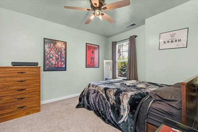 3673 N Denali Ave, Fresno, CA 93727 - carpeted bedroom with baseboards and ceiling fan