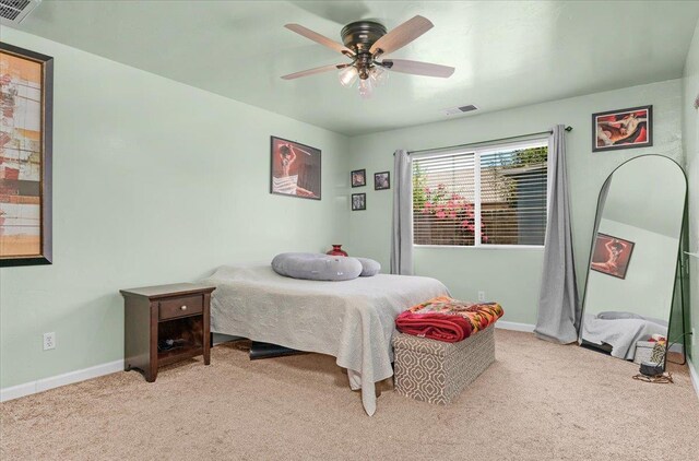 3673 N Denali Ave, Fresno, CA 93727 - bedroom with light carpet and a ceiling fan