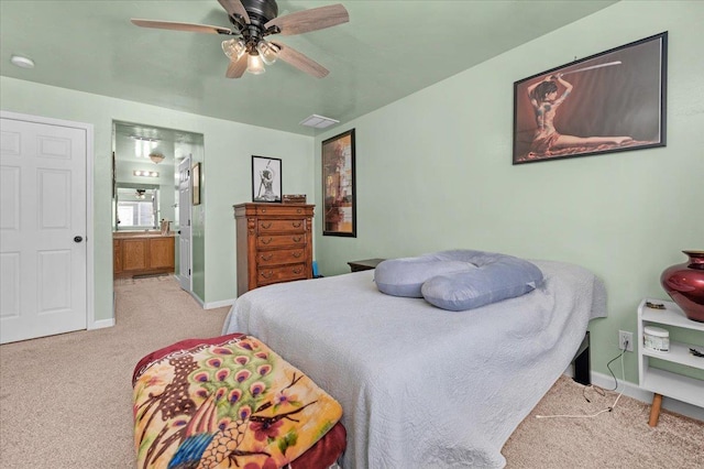 3673 N Denali Ave, Fresno, CA 93727 - bedroom with carpet, ensuite bathroom, and ceiling fan