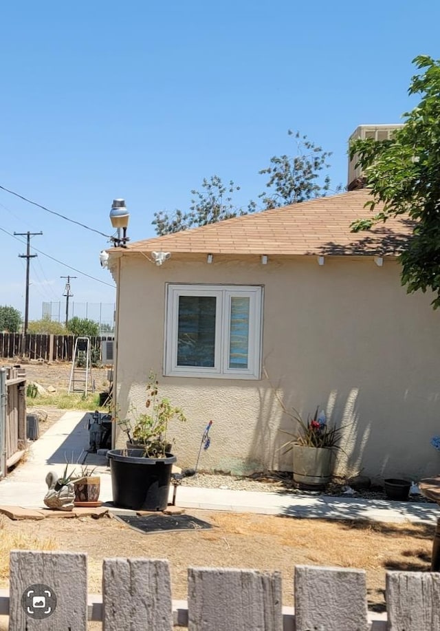 2453 S Willow, Fresno, CA 93725 - view of side of home featuring stucco siding
