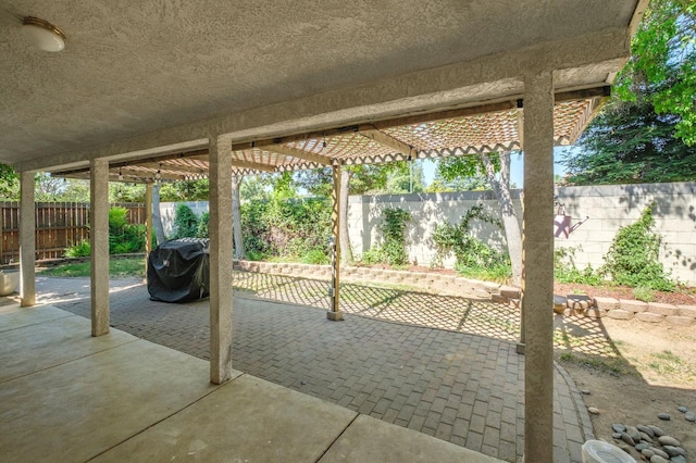 10223 N Price Ave, Fresno, CA 93730 - fenced backyard featuring a patio area and area for grilling