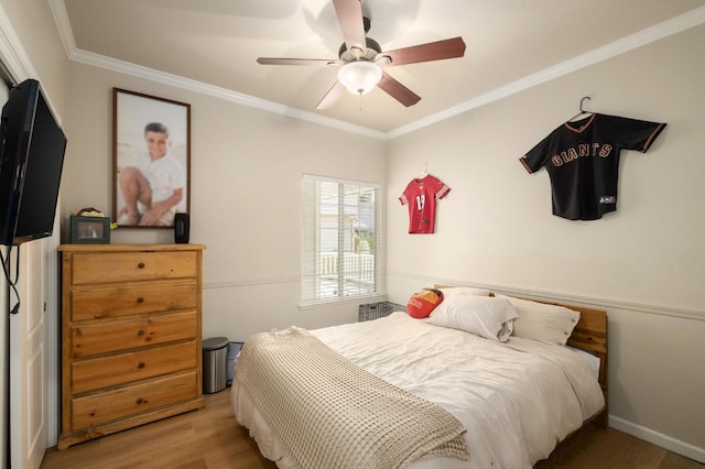 10223 N Price Ave, Fresno, CA 93730 - bedroom with wood finished floors, ornamental molding, and a ceiling fan