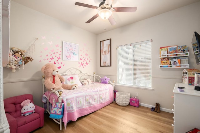 10223 N Price Ave, Fresno, CA 93730 - bedroom featuring wood finished floors and ceiling fan